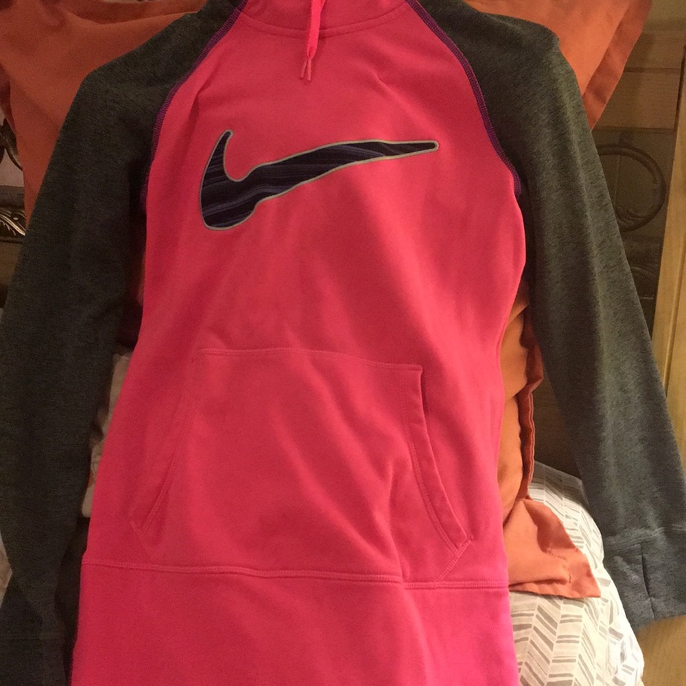 A hot pink nike sweater
